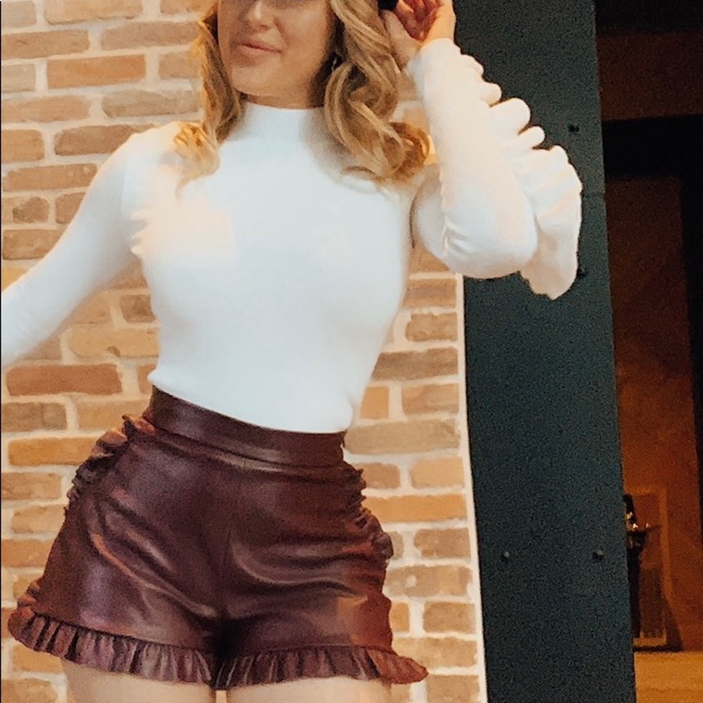 Faux leather shorts with ruffles